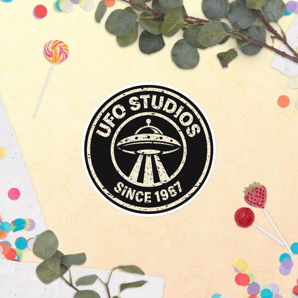 Official UFO Studios distressed circular flying saucer vinyl sticker
